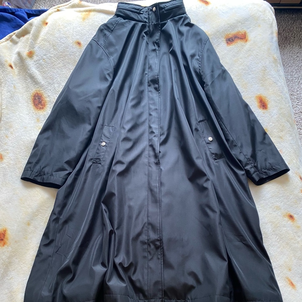 Woman Within Raincoat